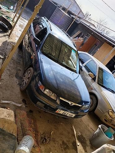 Mazda 626: 1998 г., 1.8 л, Механика, Бензин, Универсал