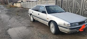 bmw e9: Mazda 626: 1989 г. — 1