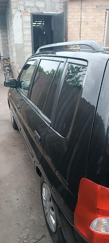 jac m3: Mazda Demio: 2000 г., Автомат, Бензин, Хэтчбэк — 6