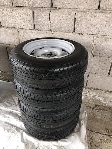 линзовые фары: Шины 185 / 70 / R 14, Лето, Б/у, Комплект, Легковые, Россия, Kama — 1