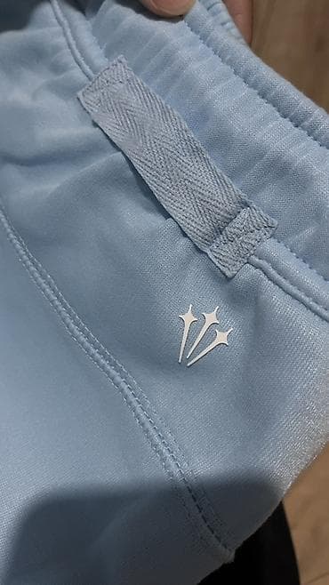 Спортивные брюки Nike NOCTA - Цвет: светло‑голубой (ice blue) - — 5