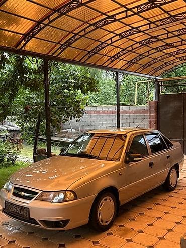 7 мест 3 ряда сидений: Daewoo Gentra / Chevrolet Lacetti — салон и оснащение - Руль с — 10