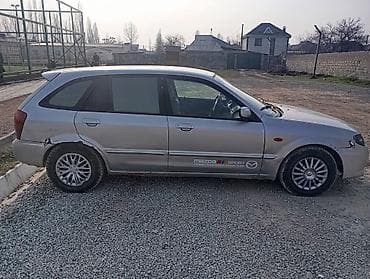 ниссан 323: Mazda 323: 2002 г., 1.6 л, Ручные, Бензин, Универсал — 2