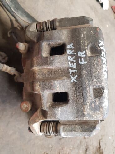 Nissan Xterra тормозной суппорт, Ниссан Икстерра 2005 по 2014год