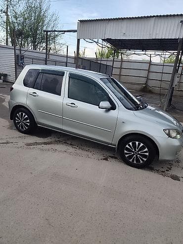 задний бампер на 124: Mazda Demio: 2003 г., 1.3 л, Автомат, Бензин, Хэтчбэк — 4
