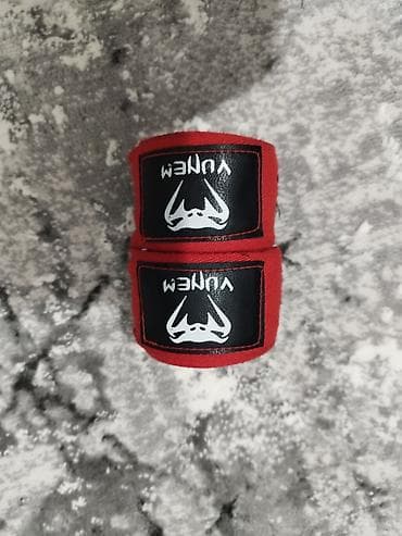 кожанные брюки: Боксерские бинты Venum, пара.
4 метра — 1