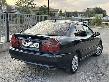 byd e1: Mitsubishi Carisma: 2003 г., 1.6 л, Механика, Бензин, Хэтчбэк — 4