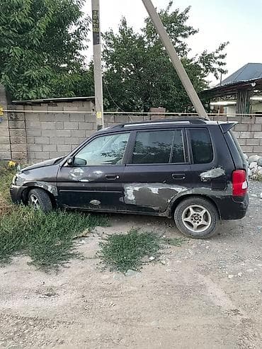 Mazda Demio: 2000 г. — 4