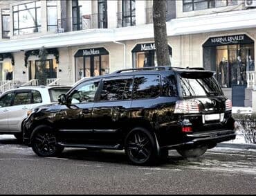 Продаю лексуса LX 570 2015год юбилей чёрный на чёрном