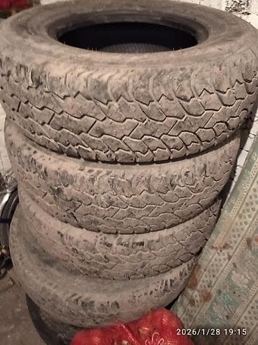летняя шина: Шины 235 / 75 / R 15, Всесезонная, Б/у, Комплект, Внедорожные (АТ/МТ), Firemax — 1