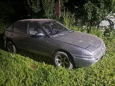 пятнашка такси: Mazda 323: 1991 г. — 1