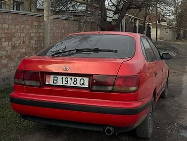 ош продается автомобиль: Toyota Carina E: 1998 г., 1.8 л, Автомат, Бензин, Хэтчбэк — 5
