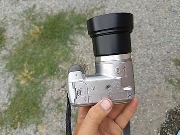 Цифровой фотоаппарат Sony (серия Cyber-shot, с видоискателем и экраном — 9