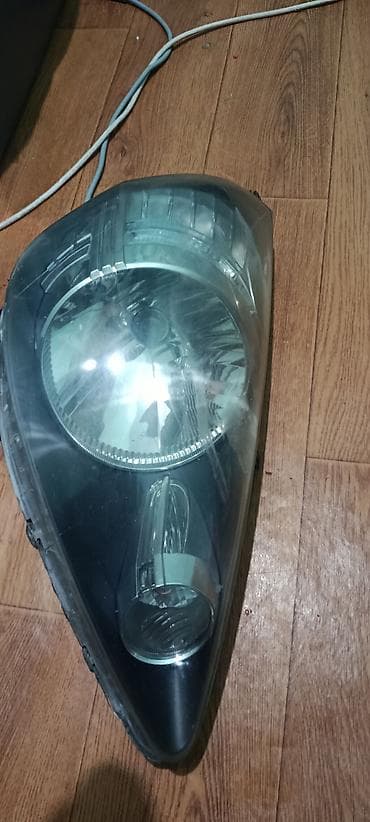 Автокосметика: Передняя левая фара Toyota Оригинал — 1