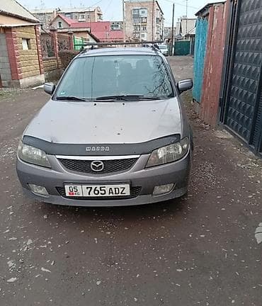 Mazda 323: 2002 г., 1.6 л, Механика, Бензин, Хэтчбэк
