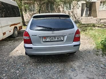 купить авто мазда трибют: Mazda 323: 2000 г., 1.5 л, Механика, Бензин, Хэтчбэк — 8
