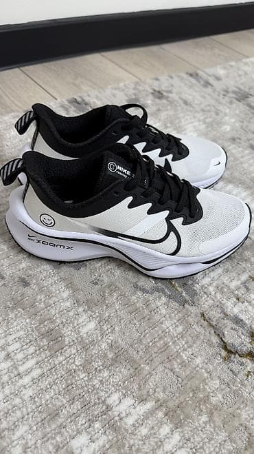 nike react: Кроссовки Nike ZoomX (белые с чёрным) - Модель с амортизацией ZoomX — 6