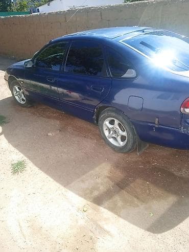 мазда 1994: Mazda 626: 1995 г., 2 л, Механика, Бензин, Хэтчбэк — 4