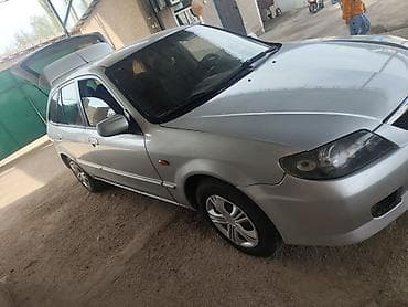 нехсиа 2: Mazda Familia: 2003 г., 1.6 л, Ручные, Бензин, Универсал — 2