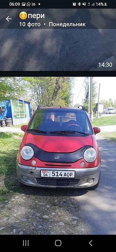 кадамжай авто: Компактный городской хэтчбек красного цвета с серебристым обвесом — 2