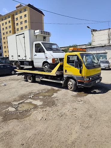 Транспорт: Эвакуатор для перевозки автомобилей и малотоннажных грузовиков. - — 1