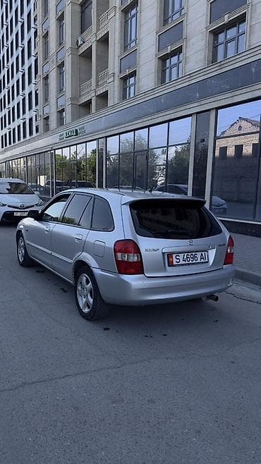 mini kooper: Mazda 323: 2001 г., 1.6 л, Ручные, Бензин, Хэтчбэк — 5