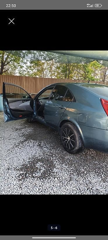 Nissan Primera: 2003 г., Хетчбек — 2