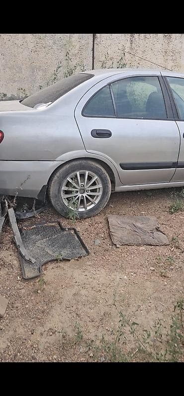 Разбор Nissan Almera (N16), серебристый седан, разбор по запчастям — 2