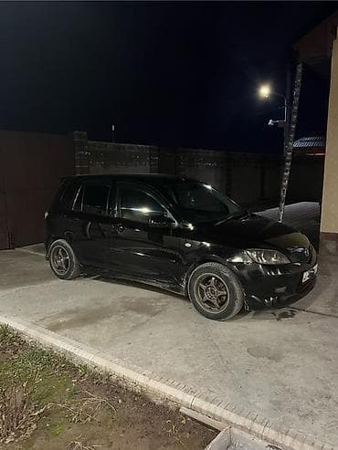 lanser 10: Mazda Demio: 2003 г., 1.3 л, Автомат, Бензин, Хэтчбэк — 2