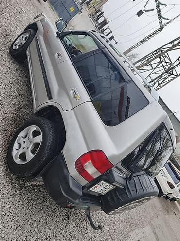 селика: Mitsubishi Pajero Pinin: 2000 г., 2 л, Ручные, Бензин, Внедорожник — 3