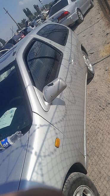 кнопки управления: Nissan Almera: 1995 г., Механика, Хэтчбэк — 5