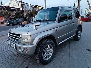 митсубиси space gear: Mitsubishi Pajero iO: 2003 г., 0.7 л, Автомат, Бензин, Внедорожник — 6