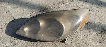 corolla e150: Передняя левая фара Toyota — 1