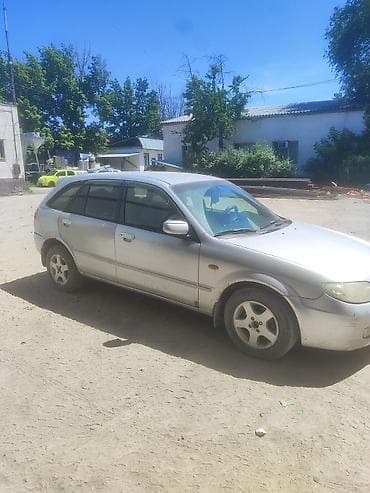 метиз 1: Mazda 323: 2002 г., 1.6 л, Механика, Бензин, Универсал — 3