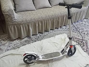 Спорт и хобби: Продаю самокат SCOOTER, амортизатор, цвет белый. Состояние отличное — 1