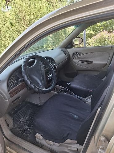 Унаа: Daewoo Nubira: 2000 г., 1.5 л, Кол менен иштөөчү, Бензин, Седан — 5