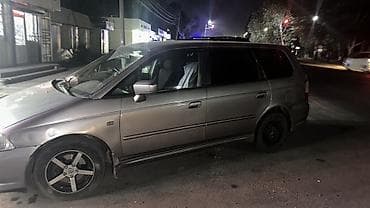 сидение одиссей: Honda Odyssey: 2002 г., 2.3 л, Автомат, Бензин, Минивэн — 6