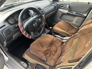 mg zr: Mazda 323: 2003 г., 1.6 л, Механика, Бензин, Седан — 5