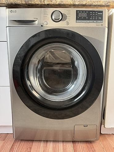 lg oled: Стиральная машина LG с фронтальной загрузкой, серебристый корпус — 2