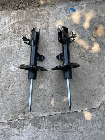 Детали ходовой части: Комплект амортизаторов Toyota 2023 г., Новый, Оригинал — 1