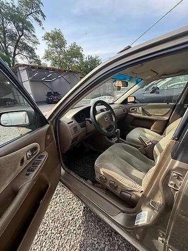 Продажа авто: Mazda Protege: 2000 г., 2 л, Автомат, Бензин, Седан — 4