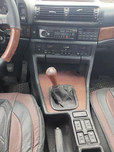круглый: BMW 7 series: 1991 г., 3 л, Механика, Бензин, Седан — 7