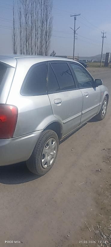 chery tiggo: Mazda 323: 2003 г., 1.6 л, Ручные, Бензин, Хэтчбэк — 8