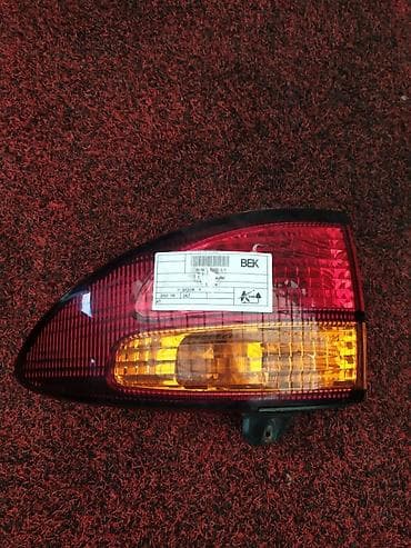 emin: Фонарь заднего хода правый для Toyota Estima, год 2001. - — 1