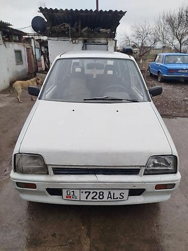 Daihatsu Cuore: 1988 г., 0.8 л, Механика, Бензин, Хэтчбэк — 1