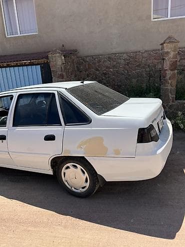 хундай аванте 1: Daewoo Nexia: 2012 г., Кол менен иштөөчү, Седан — 8