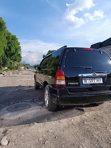 хендай тускани 2002: Mazda Tribute: 2002 г., 2 л, Автомат, Бензин, Внедорожник — 5
