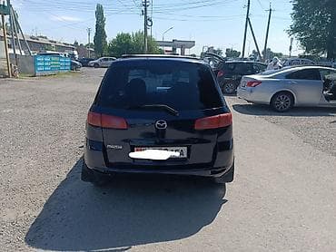 боковой: Mazda Demio: 2004 г., 1.5 л, Автомат, Бензин, Хэтчбэк — 4