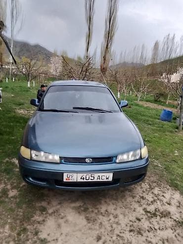 ош ишкаван: Mazda Cronos: 1993 г., 2 л, Кол менен иштөөчү, Бензин, Седан — 1