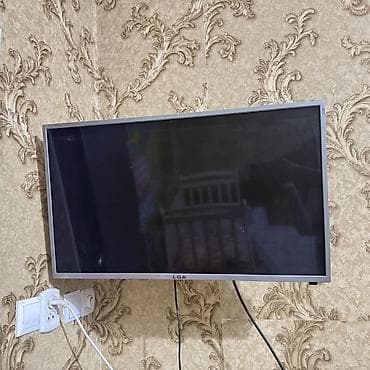 32 дюйм: Телевизор LGA, диагональ примерно 32–37 дюймов (широкоформатный) — 1